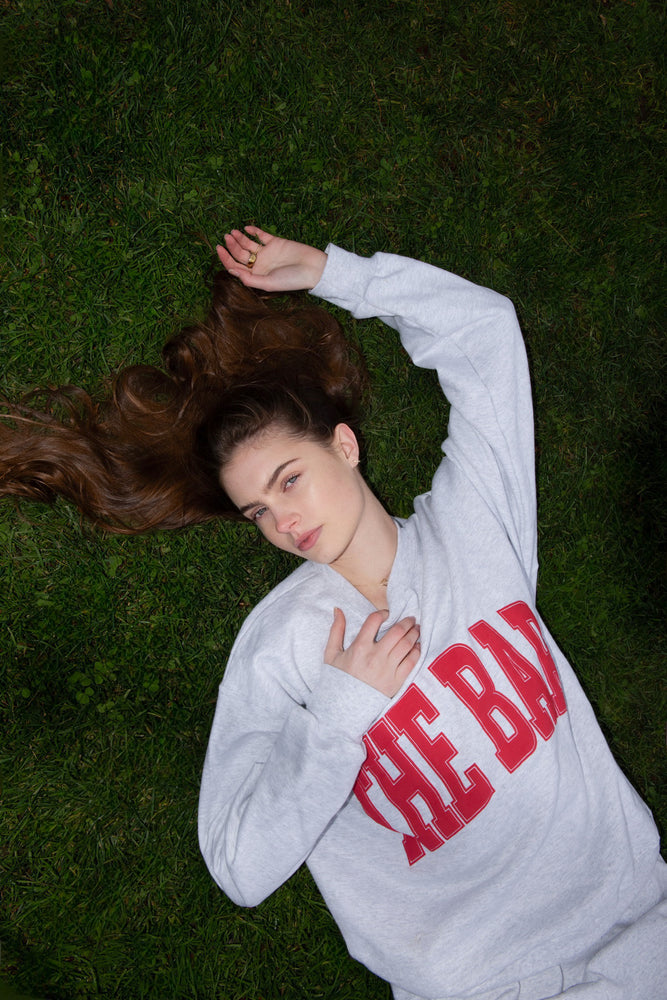 
                  
                    Load image into Gallery viewer, VARSITY SWEATSHIRT LT HEATHER GREY/BIG APPLE RED
                  
                