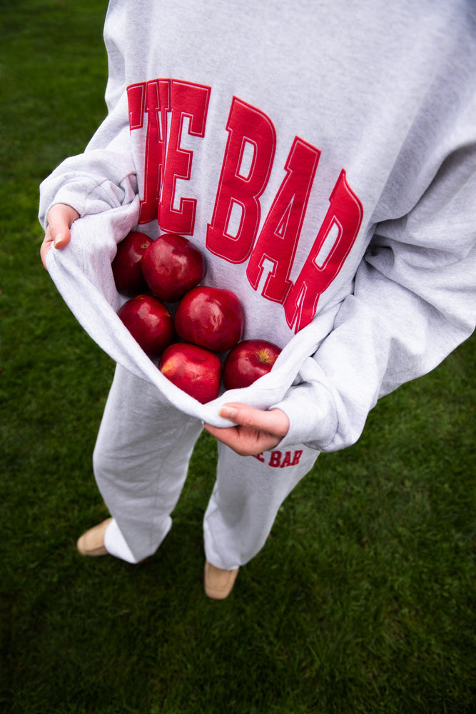 
                  
                    Load image into Gallery viewer, VARSITY SWEATSHIRT LT HEATHER GREY/BIG APPLE RED
                  
                