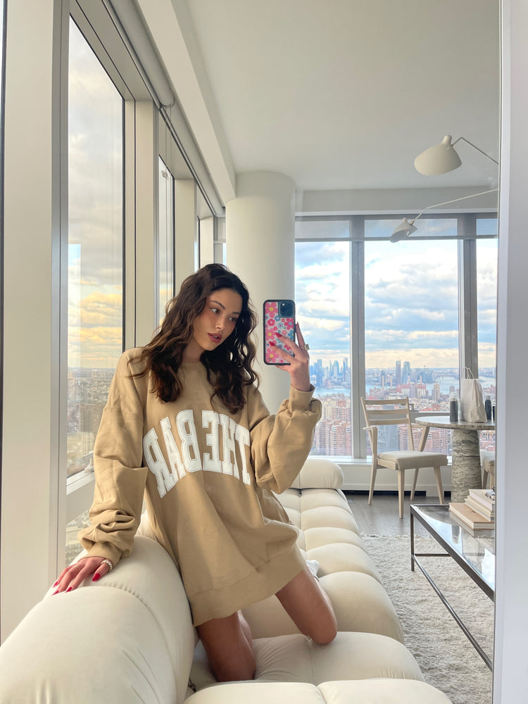 
                  
                    Load image into Gallery viewer, VARSITY SWEATSHIRT BEIGE
                  
                
